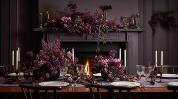 Dinner table setting in the warm glow of candlelight, tablescape featuring floral centerpiece, elegant burgundy glassware, and luxurious gold cutlery photo