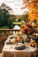 Autumn table scape, autumnal dinner table setting, holiday tablescape for wedding, birthday or party event celebration, photo