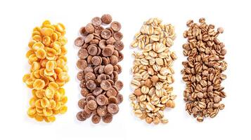 Assortment of cereal, grains, muesli or oats for healthy breakfast, organic farm market product isolated on white background photo