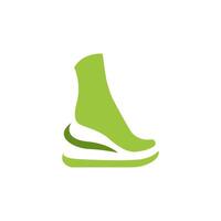 a green shoe with a green sock on top vector