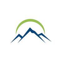 a mountain logo with a green circle vector