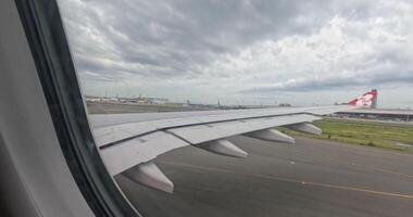 Taking off from The Miraculous Floating Airport Kansai Osaka Japan. Window view video