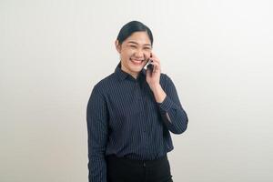 Asian woman using smartphone or mobile phone photo