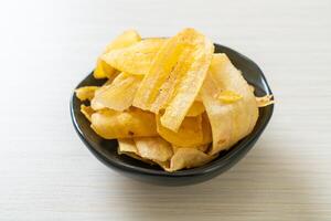 Banana Chips - fried or baked sliced banana photo