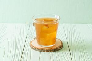 Delicious sweet drink tamarind juice and ice cube photo