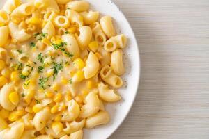 macaroni creamy corn cheese on plate photo