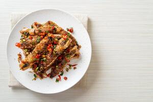 Stir-fried Mantis Shrimp or Crayfish with Chilli and Salt. photo