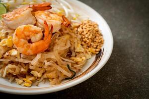 stir-fried noodles with shrimp and sprouts or Pad Thai photo