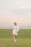 Happy young Asian women in bride clothing with veil photo