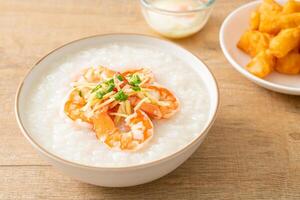 Congee with shrimps and fresh ginger photo