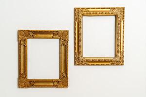 empty picture frame on white wall background photo