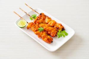 grilled chicken skewer with herbs and spices photo