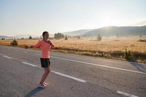 Determined Stretch. Athletic Woman Embraces Post-Run Flexibility in Nature. photo