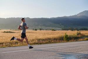 Determined Stride. Athletic Man Embarks on Marathon Preparation with Resolve. photo