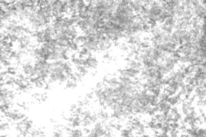 Black dots grunge halftone texture effect background. vector