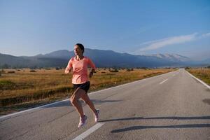 Determined Dawn. Confident and Motivated Athlete Embarks on Sunrise Run. photo