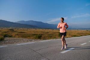 Determined Dawn. Confident and Motivated Athlete Embarks on Sunrise Run. photo