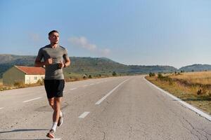 Energized by the beauty of nature, a couple powers through their morning run, their bodies and spirits invigorated. photo