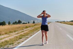 Close-Up Portrait of Determined Athlete Resting After Intense Workout photo