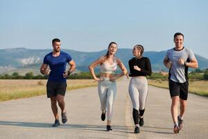 A group of friends maintains a healthy lifestyle by running outdoors on a sunny day, bonding over fitness and enjoying the energizing effects of exercise and nature photo