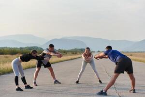 Diverse Group of Athletes Prepare Together for a Run photo