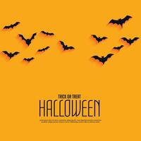 yellow happy halloween background with flying bats vector