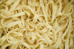 Boiled noodles in close-up. Cooking noodles. photo