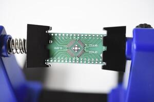 A printed circuit board for trace elements. Radio electronics. A holder for printed circuit boards. photo