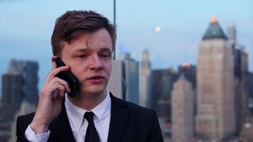 Young Businessman Talking and Chatting on Phone Call in the City video