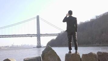 Male Person Walking Over Stone Rocks Overcoming Obstacles and Succeed video