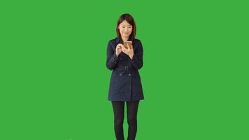 Young Asian Woman Standing Isolated on Green Screen Background video