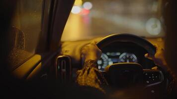 Female Person With Black Curly Hair Driving Car In The City At Night Traffic video