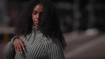 Happy Young Woman with Curly Hair Dancing on City Street in Slow Motion video