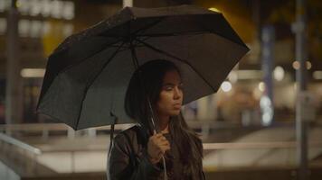 Young Sad Female Person Commuting in Urban City Town in Raining Weather video