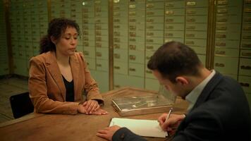 Multi Ethnic Group of Two People Having a Business Sales Meeting Inside Bank video