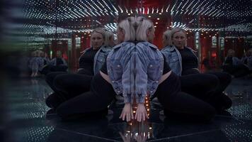 Young Blond Woman Exploring Room of Mirrors in Dreamlike Fantasy Neon Light video