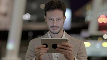 Businessman Networking on Mobile Tablet Device in the City video
