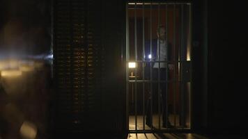 Young Sales Bank Manager Searching Dark Vault Safe Room Using Flashlight video