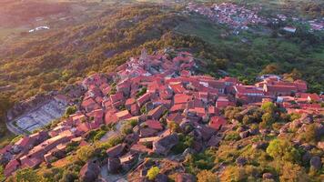 Monsanto Village at Sunset. Portugal. Aerial View. Drone Moves Backwards and Upwards video