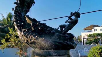 Puerto Escondido Oaxaca Mexico 2023 Statue sculpture angler with fish fountain in Puerto Escondido Mexico. video