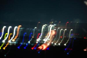 Abstract blurry background with pattern from colorful traces photo
