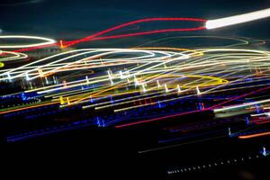 Abstract blurry background with pattern from colorful traces photo
