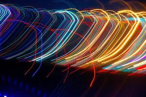 Abstract blurry background with pattern from colorful traces photo