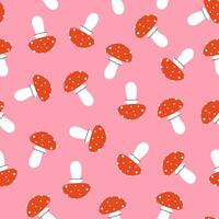 Simple seamless pattern with cute fly agarics. graphics. vector