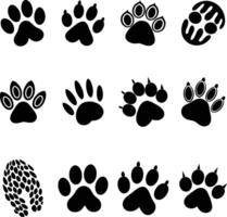 set of black silhouettes of different animal paw vector