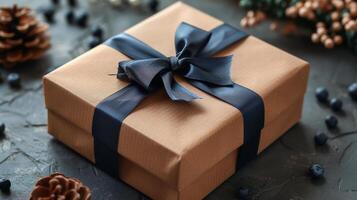 Brown Box With Bow on Table photo