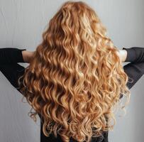 Woman With Long Blonde Hair Seen From Behind photo