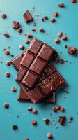 Pile of Chocolate on Blue Table photo