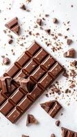 A Pile of Chocolate on Top of a White Table photo
