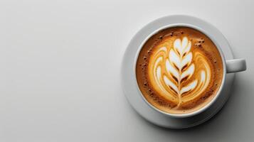 A Cup of Coffee With a Leaf photo